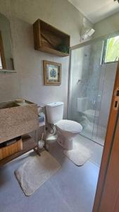 Vila Manah 203, Quarto e sala, acomoda 4 pessoas com Ar Condicionado, Wifi, Smart Tv, Cozinha completa, Portaria 24h e Estacionamento