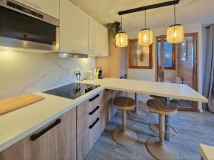 Appartements Le Nuage - 2050 Belle Plagne, F2 Ski aux pieds : photos des chambres