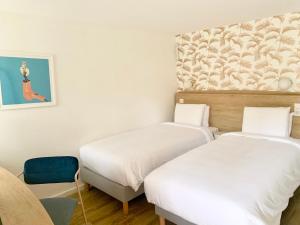 Hotels Kyriad Cannes - Mandelieu : photos des chambres