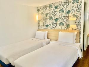 Hotels Kyriad Cannes - Mandelieu : photos des chambres