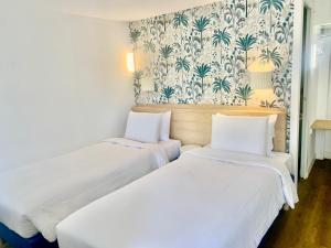 Hotels Kyriad Cannes - Mandelieu : photos des chambres