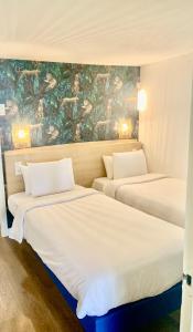 Hotels Kyriad Cannes - Mandelieu : photos des chambres