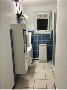 Appartement rez-de-jardin proche du centre ville et de la cure