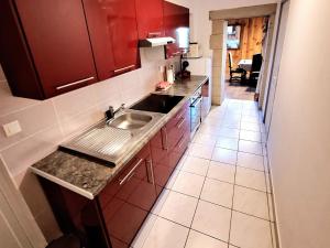 Appartements Le Saloon : photos des chambres
