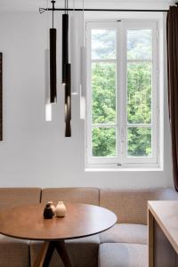 Appartements A- Aix-Capade & SPA - Jacuzzi : photos des chambres