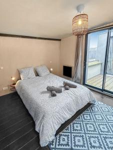 Maisons de vacances Maison Atypique acces direct Paris, Cuisine design : photos des chambres