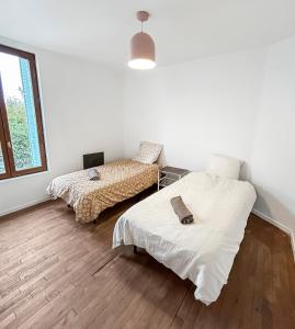 Maisons de vacances Maison Atypique acces direct Paris, Cuisine design : photos des chambres