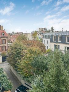 Maisons de vacances Maison Atypique acces direct Paris, Cuisine design : photos des chambres