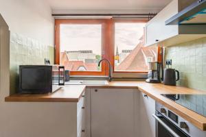 Appartements Le charme de l-ancien allie au contemporain : photos des chambres
