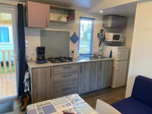 Campings Mobil-home confort dans impasse boisee : photos des chambres