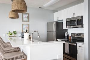 Stunning Waterfront, Updated TC Condo with Pool!