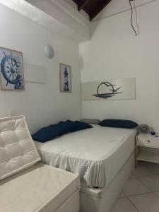 Quarto lateral da beira mar - tombo - guarujá