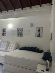 Quarto lateral da beira mar - tombo - guarujá