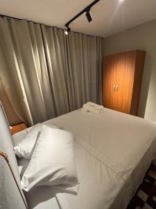 Ap Aconchego central com estacionamento