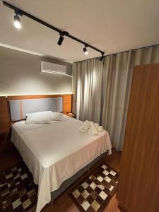 Ap Aconchego central com estacionamento