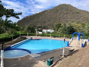 Condominio la Orquídea - Apulo