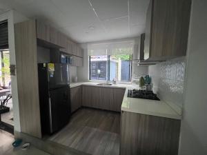 Condominio la Orquídea - Apulo