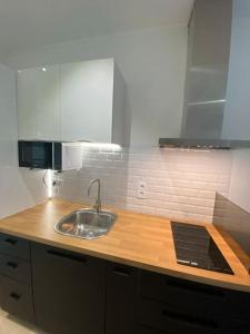 Appartements Studio cosy avec jardin, tramway : photos des chambres