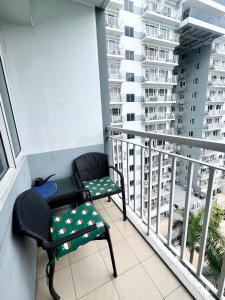 Kathys Crib with balcony Pool view at Shell Residence