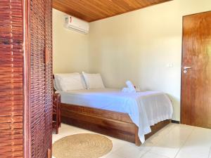 204 - Village aconchegante em frente a praia de Itacimirim