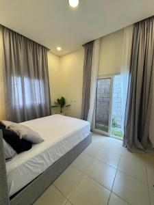 Casa cómoda cerca Aeropuerto Palmerola fácil acceso