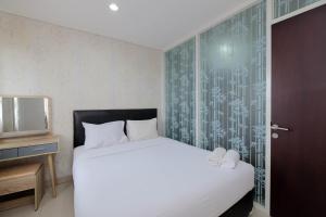 Clean and Cozy 1BR Apartment with Sofabed at Atlanta Residences By Travelio