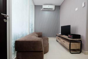 Clean and Cozy 1BR Apartment with Sofabed at Atlanta Residences By Travelio