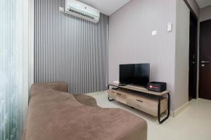 Clean and Cozy 1BR Apartment with Sofabed at Atlanta Residences By Travelio