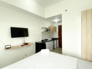 Comfort and Cozy Designed Studio Sayana Bekasi Apartment By Travelio