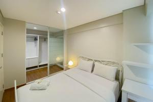 Homey and Modern 1BR at Kebagusan City Apartment By Travelio