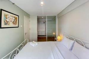 Homey and Modern 1BR at Kebagusan City Apartment By Travelio