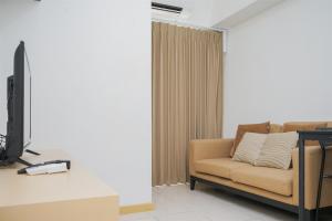 Nice and Comfy 2BR Apartment at M-Town Residence near Summarecon By Travelio