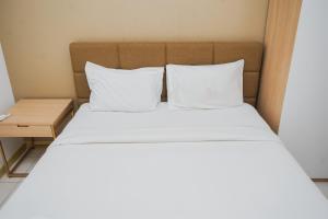 Nice and Comfy 2BR Apartment at M-Town Residence near Summarecon By Travelio