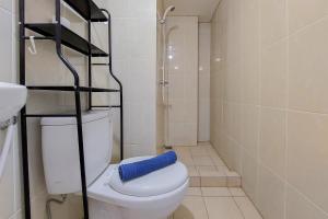 Nice and Comfy 2BR Apartment at M-Town Residence near Summarecon By Travelio