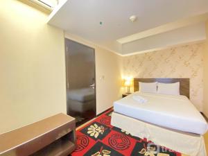 Fancy and Nice 2BR at Braga City Walk Apartment By Travelio