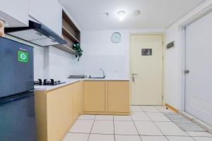 Homey and Modern 2BR Apartment at M-Town Residence By Travelio