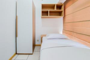 Homey and Modern 2BR Apartment at M-Town Residence By Travelio