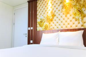 Best and Simply Modern 1BR Apartment at Tuscany Residences By Travelio