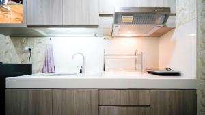Best Location and Homey 1BR Apartment at Trillium Residence By Travelio