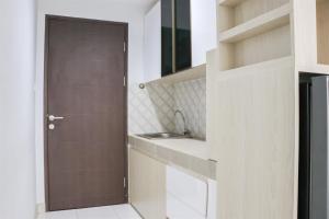Cozy and Nice Studio Apartment at Mekarwangi Square Cibaduyut By Travelio