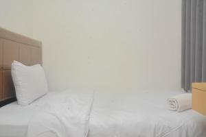 Strategic and Minimalist 2BR at Bassura City Apartment By Travelio