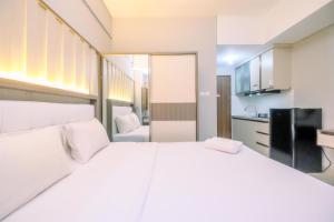 Modern Look Studio LRT City Sentul - Royal Sentul Park Apartment By Travelio
