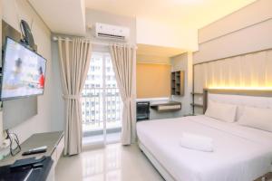 Modern Look Studio LRT City Sentul - Royal Sentul Park Apartment By Travelio