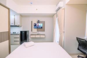 Modern Look Studio LRT City Sentul - Royal Sentul Park Apartment By Travelio