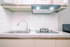 Modern Look Studio LRT City Sentul - Royal Sentul Park Apartment By Travelio