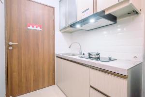 Modern Look Studio LRT City Sentul - Royal Sentul Park Apartment By Travelio