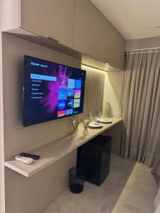 Flat piscina borda infinita a 50m do mar - 214