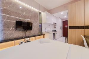 Scenic and Restful Studio Sky House BSD Apartment By Travelio