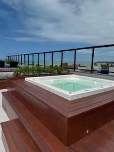 Flat piscina borda infinita a 50m do mar - 214