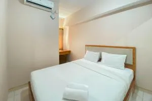 Restful and Tidy 2BR Apartment Springlake Summarecon Bekasi By Travelio - Rawabugel